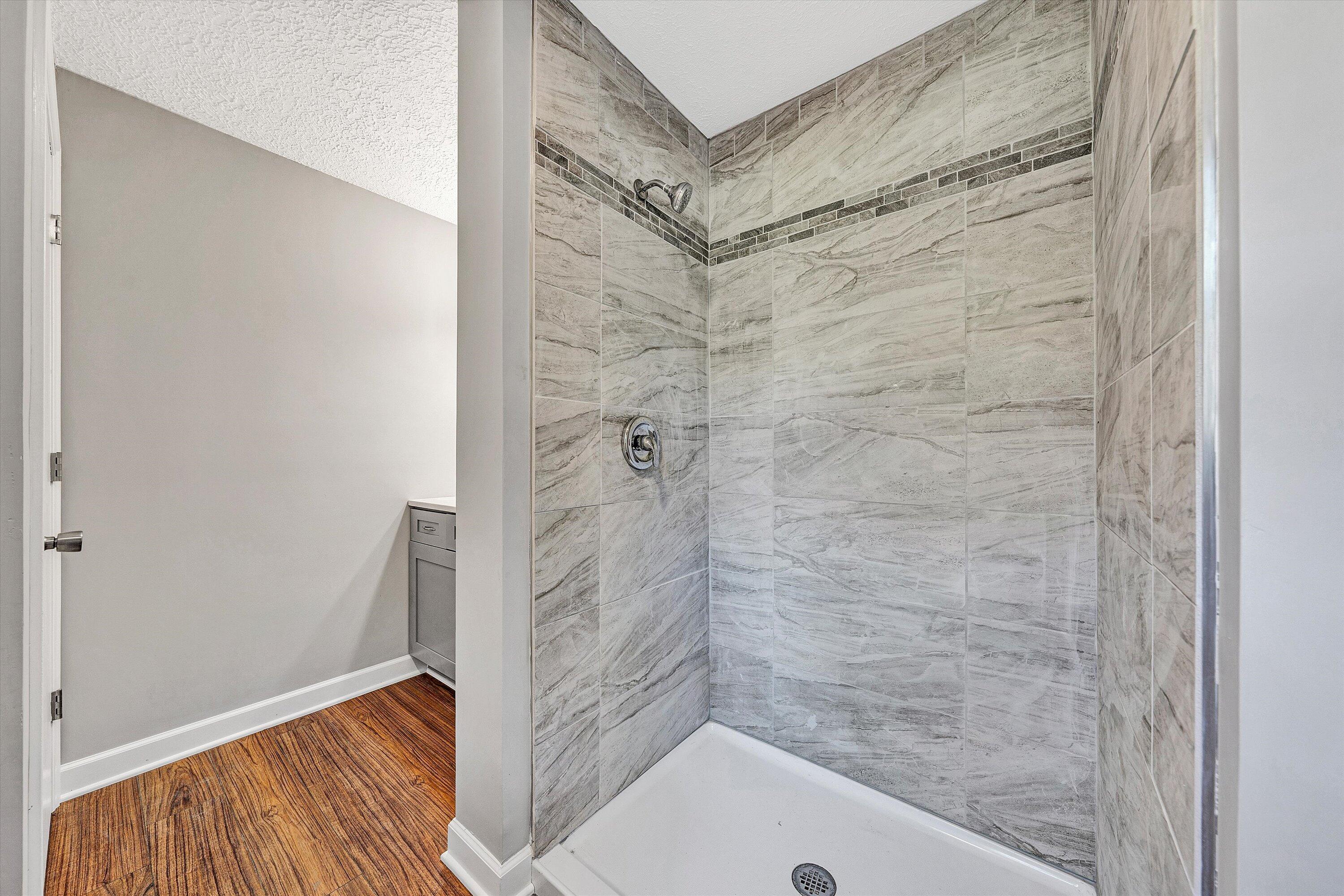 304 Broken Arrow Lane Covington, VA 24426 - Photo 29 of 46 a bathroom with a shower and a sink
