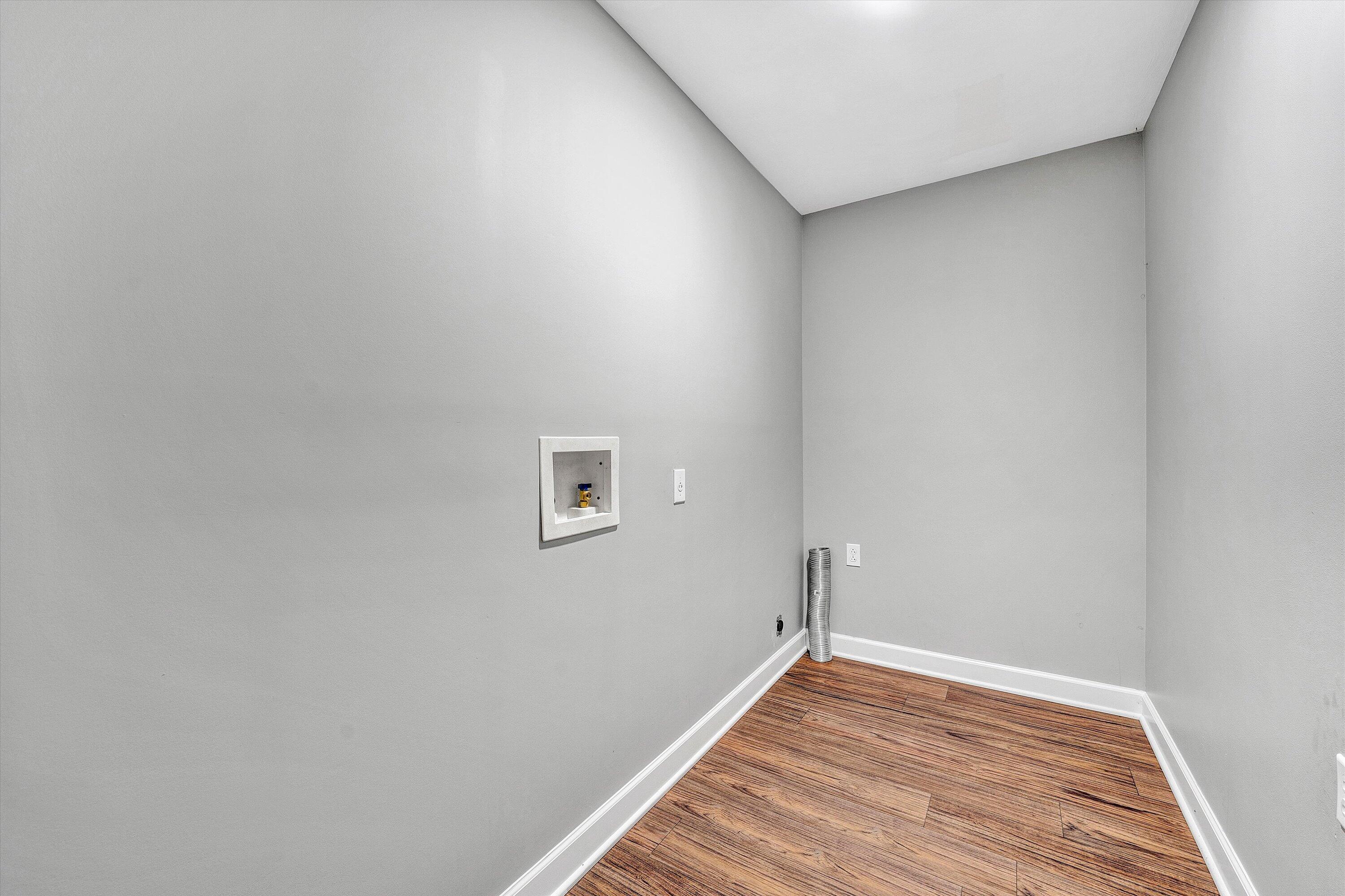 304 Broken Arrow Lane Covington, VA 24426 - Photo 31 of 46 a view of room with wooden floor and window