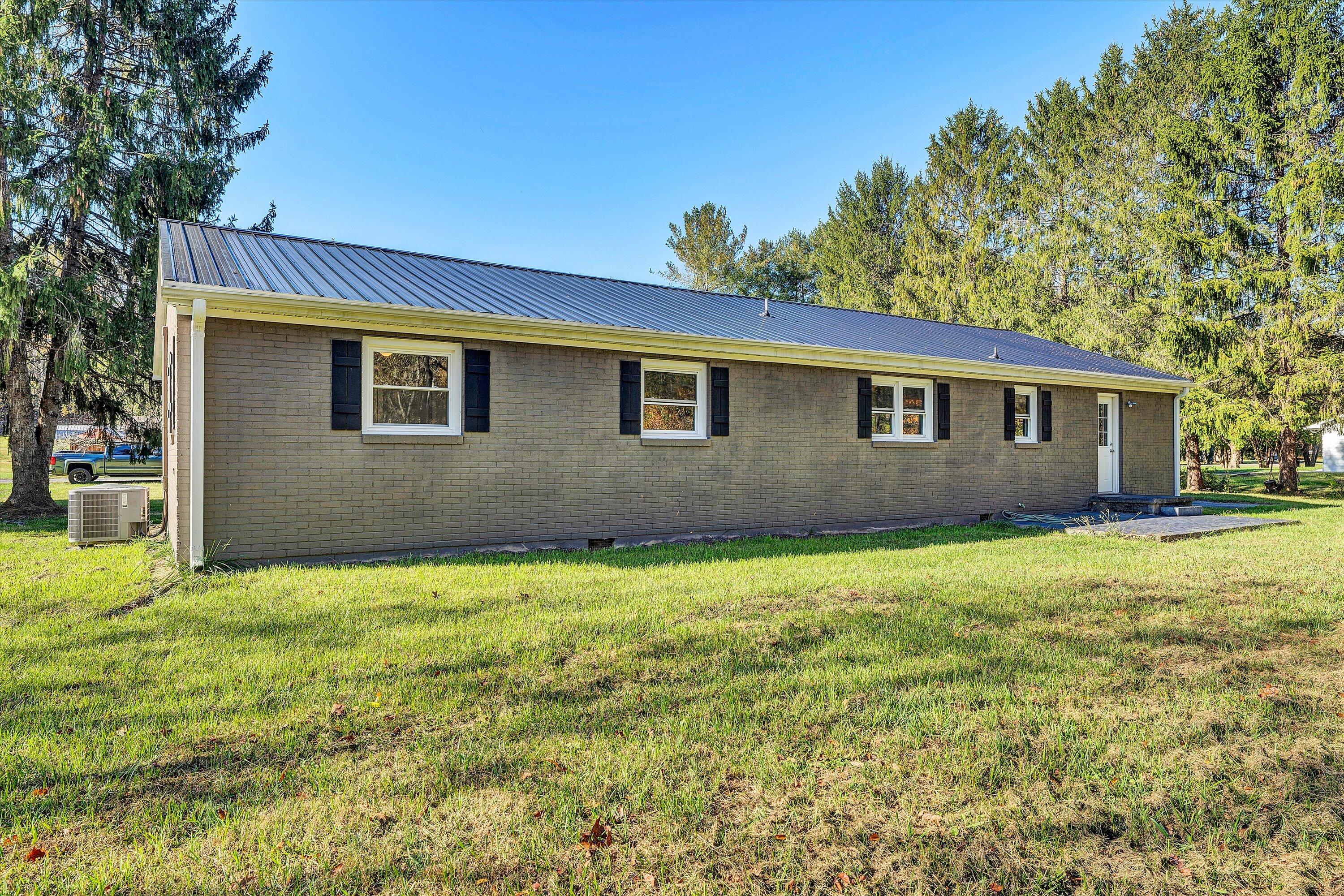 304 Broken Arrow Lane Covington, VA 24426 - Photo 38 of 46 a house view with a garden space