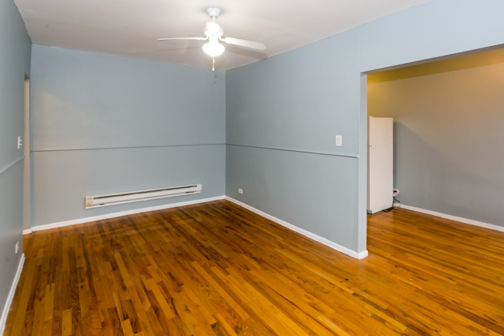 4515 North Malden Street, Unit 3C Chicago, IL 60640 - Photo 11 of 18 a view of empty room with wooden floor