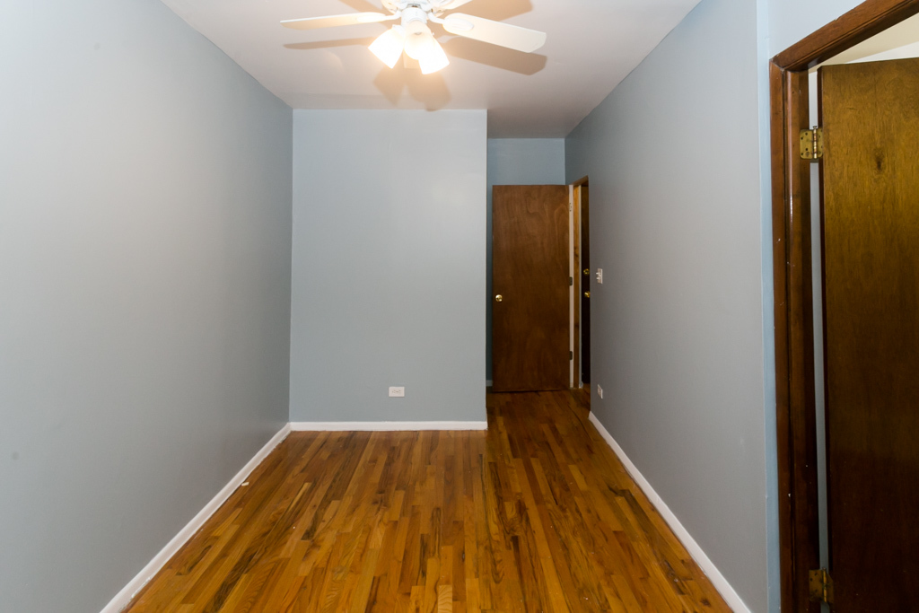 4515 North Malden Street, Unit 3C Chicago, IL 60640 - Photo 16 of 18 a view of room with wooden floor