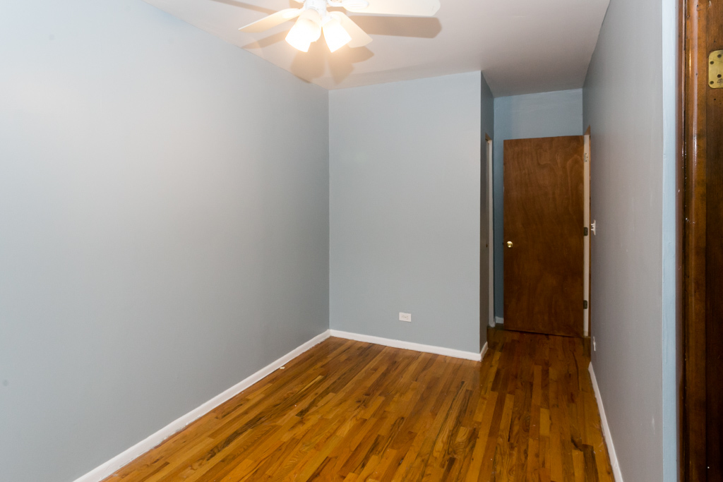 4515 North Malden Street, Unit 3C Chicago, IL 60640 - Photo 17 of 18 wooden floor in a gallery