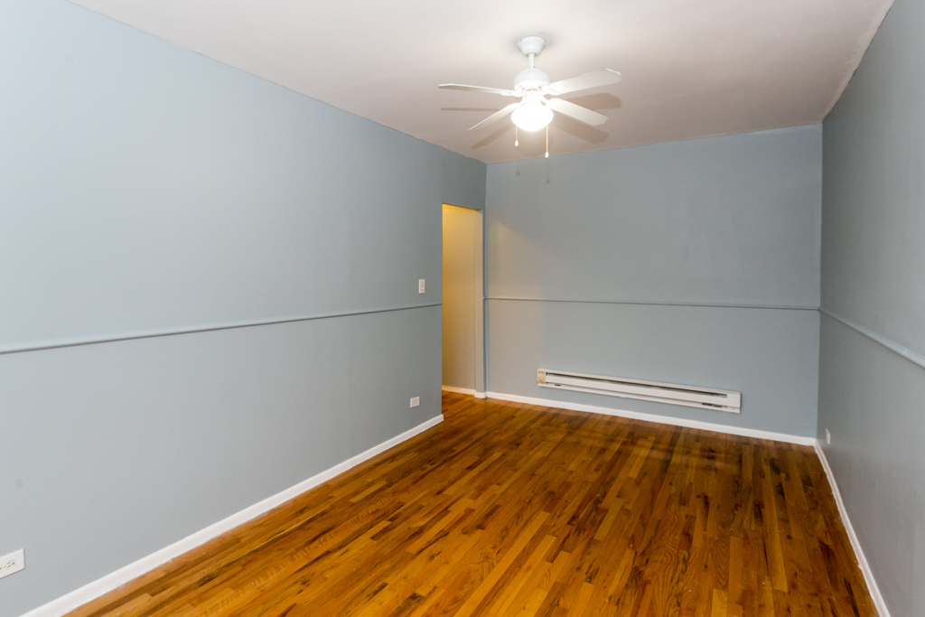 4515 North Malden Street, Unit 3C Chicago, IL 60640 - Photo 9 of 18 a view of a room with wooden floor
