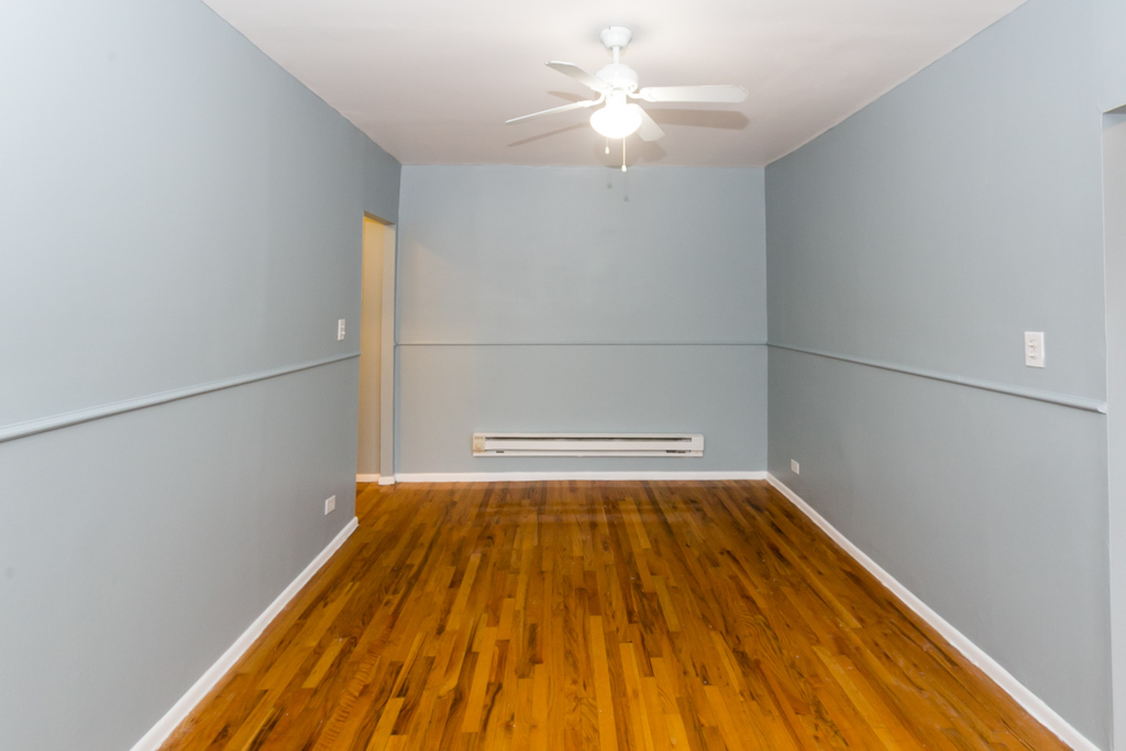 4515 North Malden Street, Unit 3C Chicago, IL 60640 - Photo 10 of 18 a view of a room with wooden floor