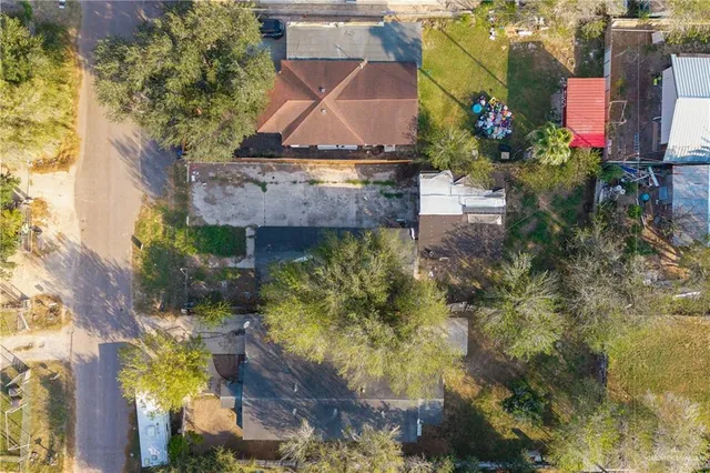 an aerial view of residential building and ocean