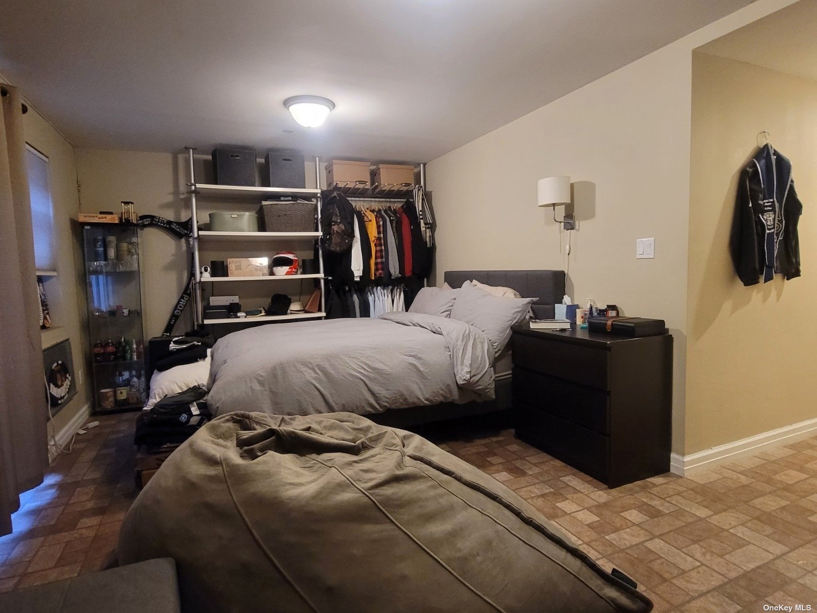 a bedroom with a bed and furniture