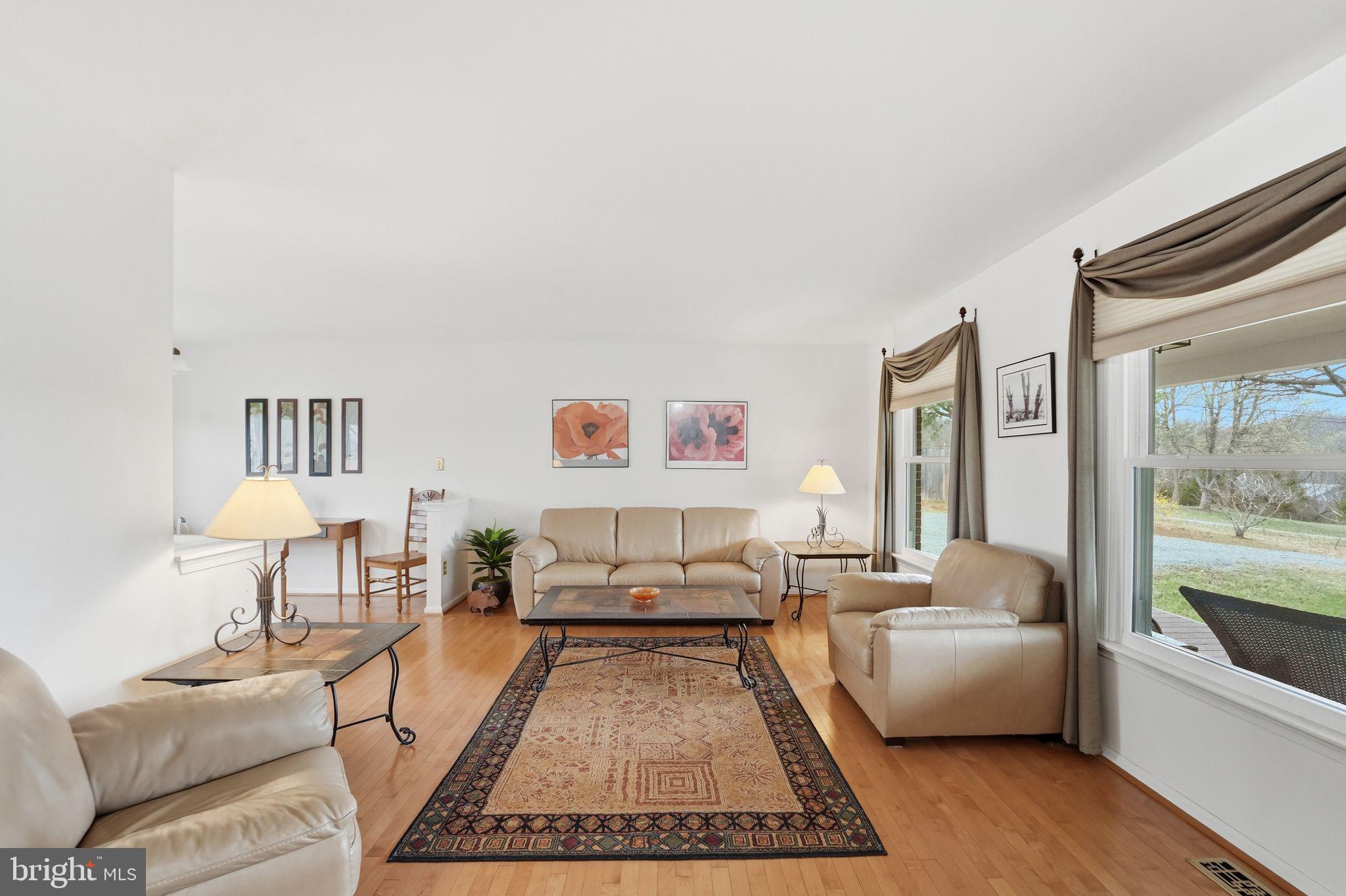 4051 Ringwood Road Nokesville, VA 20181 - Photo 12 of 58 a living room with furniture and a couch