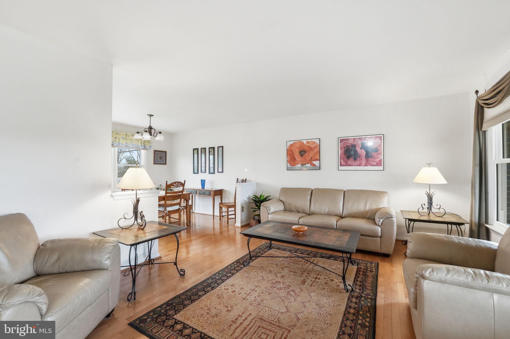 4051 Ringwood Road Nokesville, VA 20181 - Photo 14 of 58 a living room with furniture and a lamp