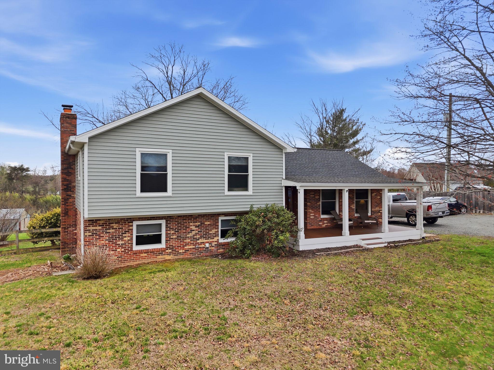 4051 Ringwood Road Nokesville, VA 20181 - Photo 2 of 58 a view of a house with a yard
