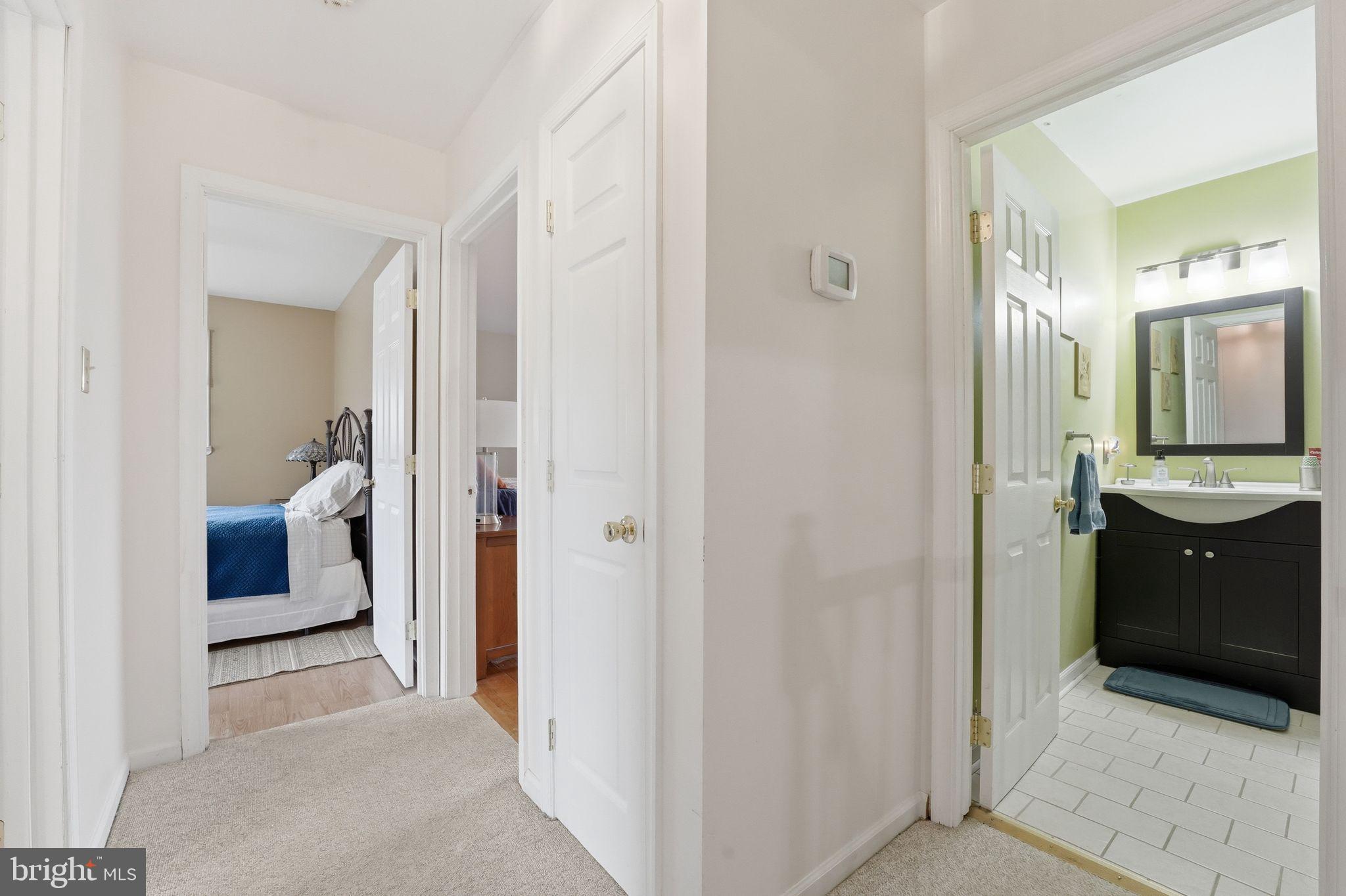 4051 Ringwood Road Nokesville, VA 20181 - Photo 24 of 58 a en suite bathroom with a sink and a mirror