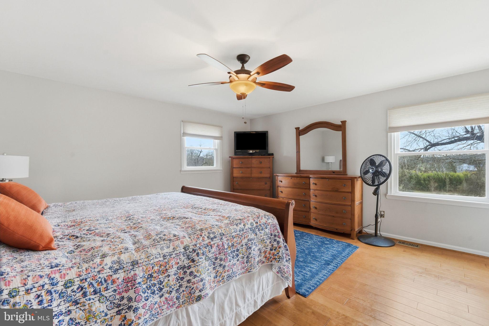 4051 Ringwood Road Nokesville, VA 20181 - Photo 30 of 58 a bedroom with a bed dresser and a window