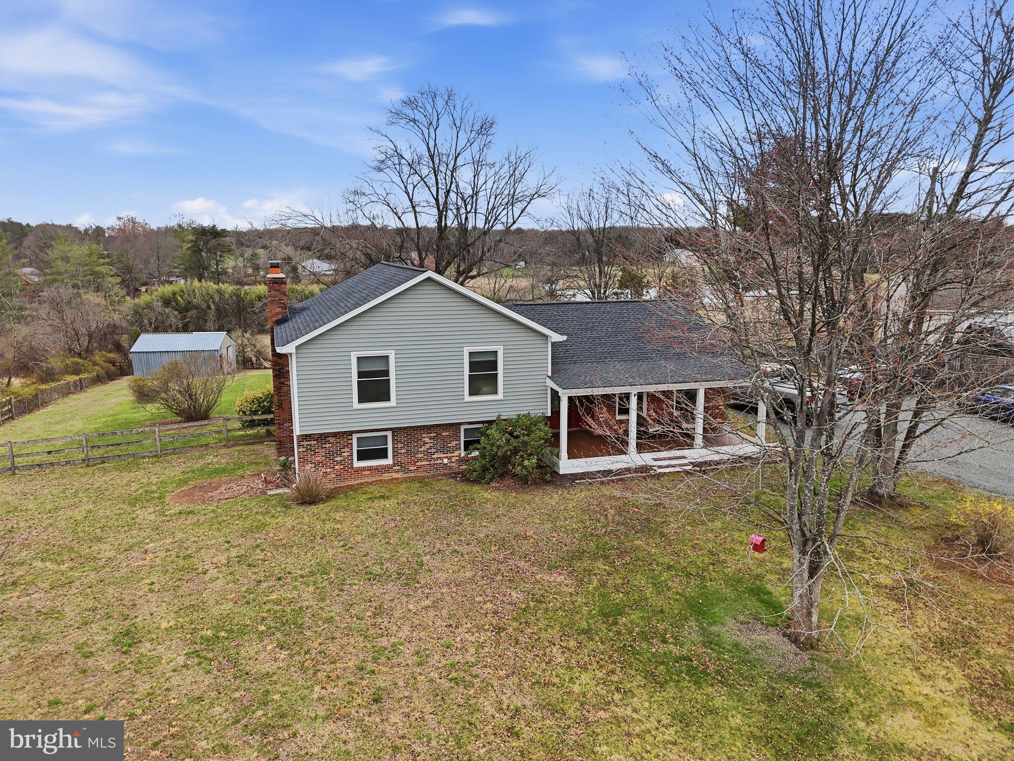 4051 Ringwood Road Nokesville, VA 20181 - Photo 3 of 58 a view of a house with a yard