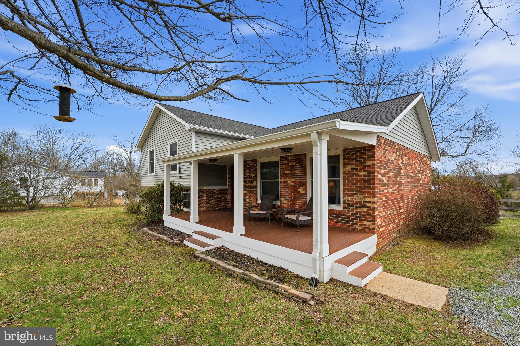 4051 Ringwood Road Nokesville, VA 20181 - Photo 42 of 58 a view of a house with backyard and porch