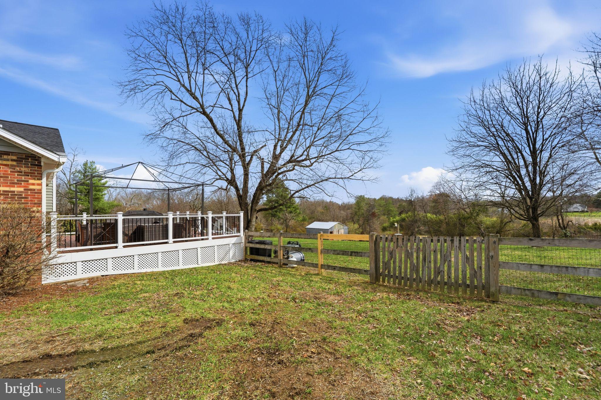 4051 Ringwood Road Nokesville, VA 20181 - Photo 45 of 58 a view of a house with backyard and trees