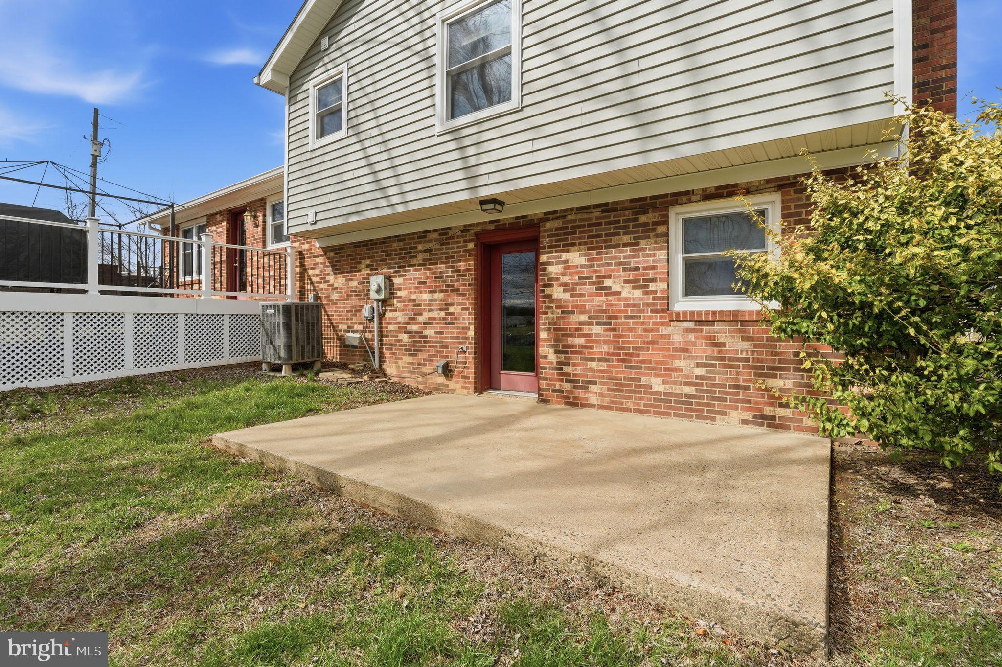 4051 Ringwood Road Nokesville, VA 20181 - Photo 50 of 58 a front view of a house with a yard and garage