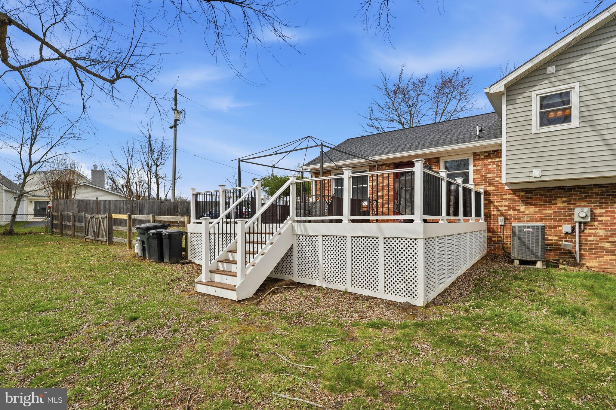 4051 Ringwood Road Nokesville, VA 20181 - Photo 51 of 58 a view of a house with a yard