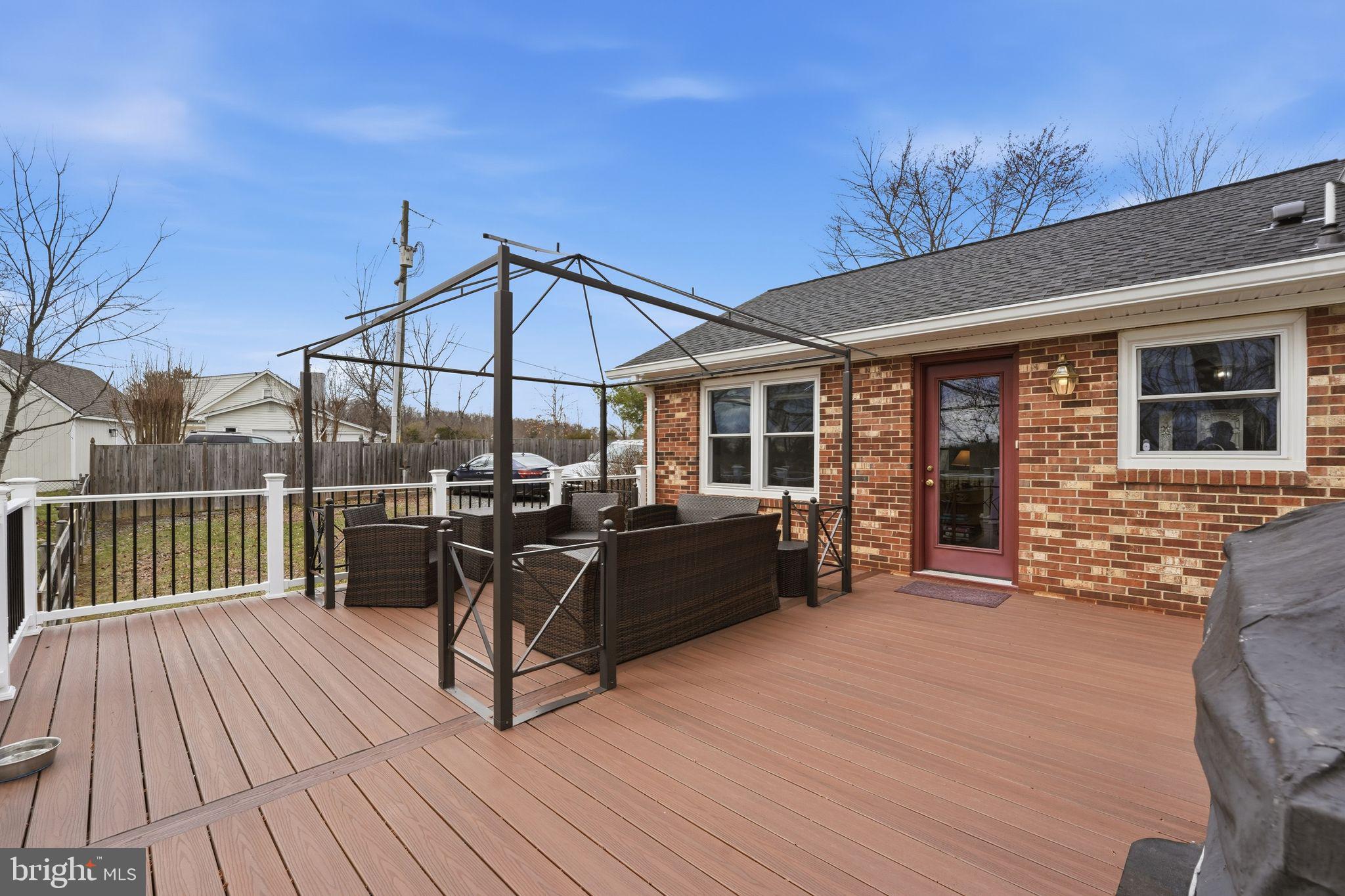 4051 Ringwood Road Nokesville, VA 20181 - Photo 53 of 58 a view of a roof deck with wooden floor and seating space