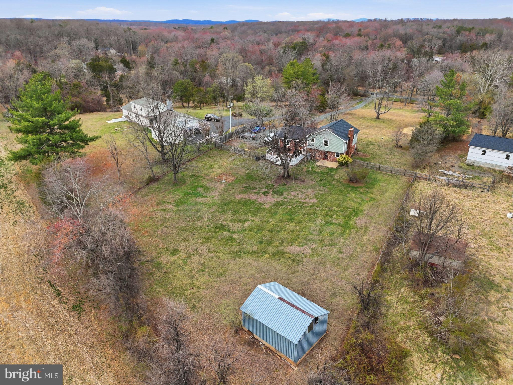 4051 Ringwood Road Nokesville, VA 20181 - Photo 7 of 58 a view of a lake with a mountain