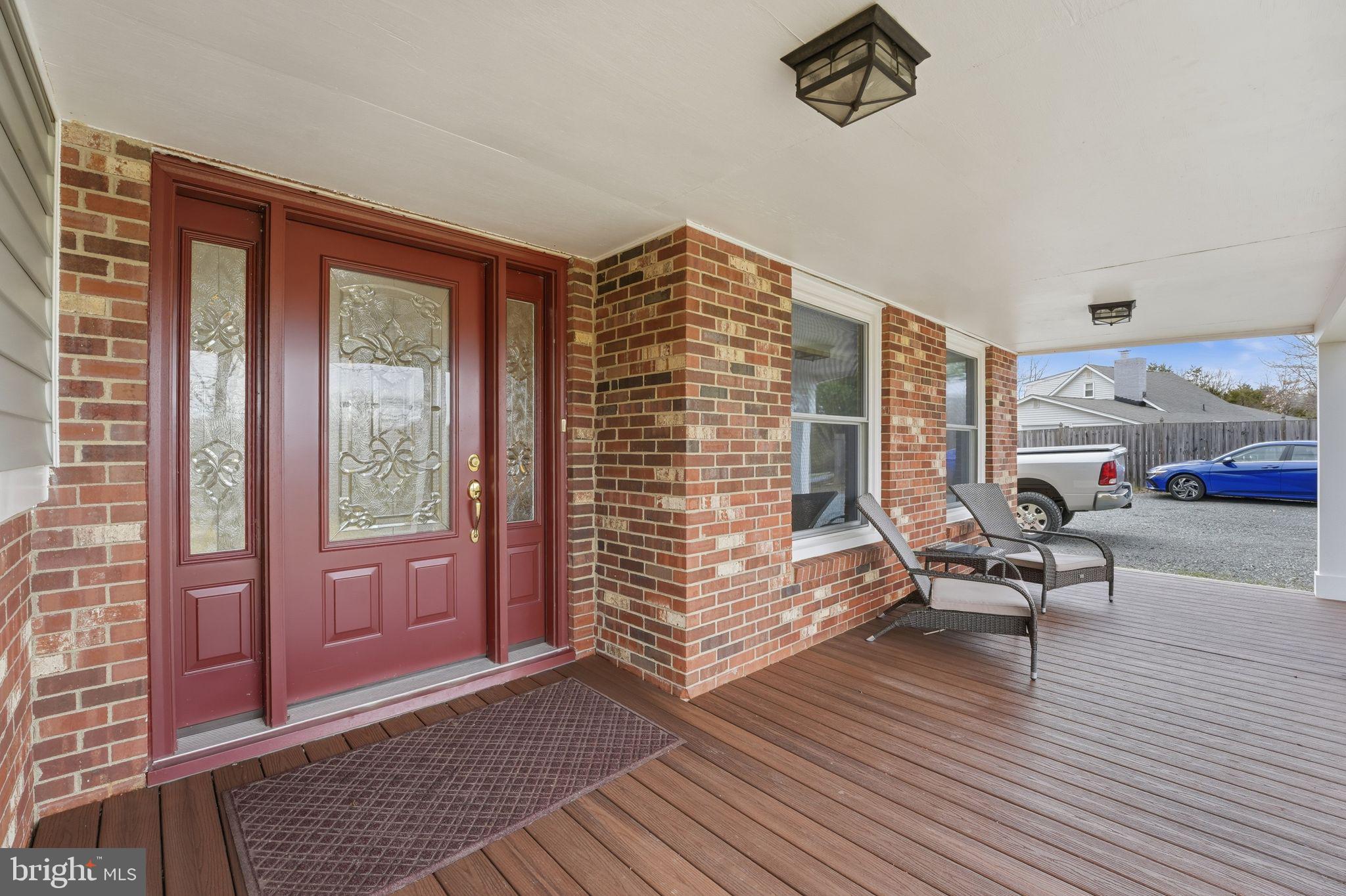 4051 Ringwood Road Nokesville, VA 20181 - Photo 9 of 58 a living room with furniture and a entrance