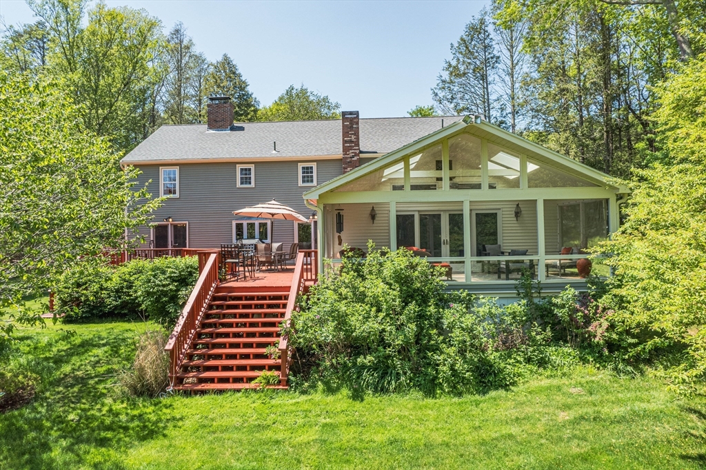 7 Beechwood Circle Boxford, MA 01921 - Photo 2 of 7 a front view of a house with a yard