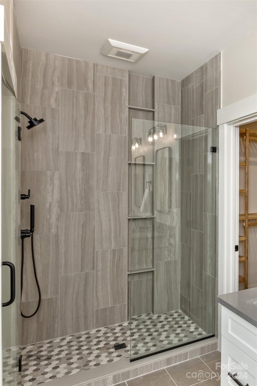 157 Gashes Creek Road Asheville, NC 28805 - Photo 19 of 43 a bathroom with a shower