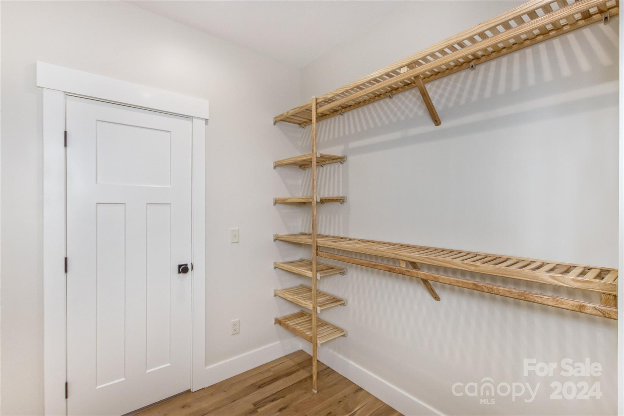 157 Gashes Creek Road Asheville, NC 28805 - Photo 23 of 43 a view of a room with racks on the wall