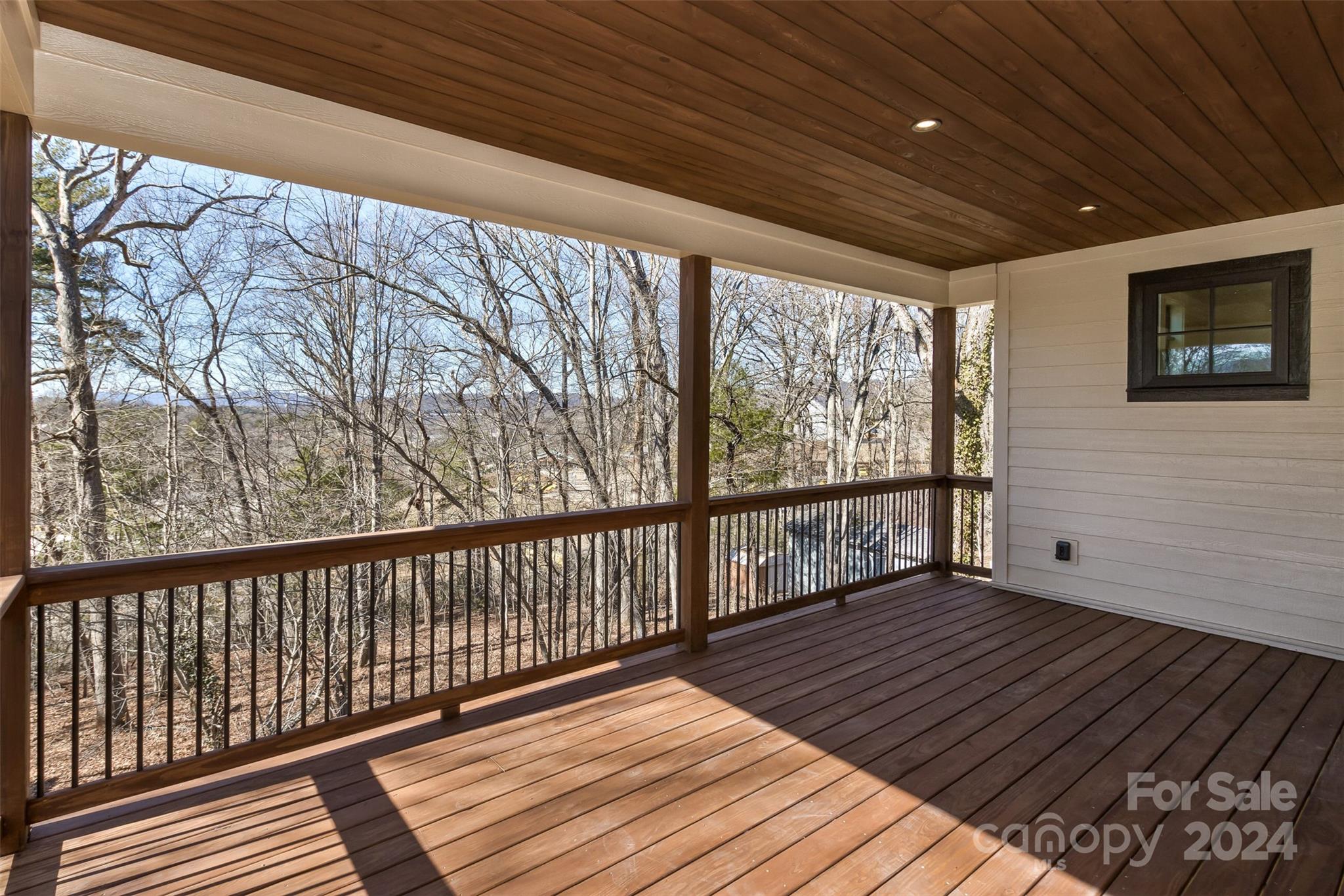 157 Gashes Creek Road Asheville, NC 28805 - Photo 38 of 43 a view of wooden balcony with wooden floor