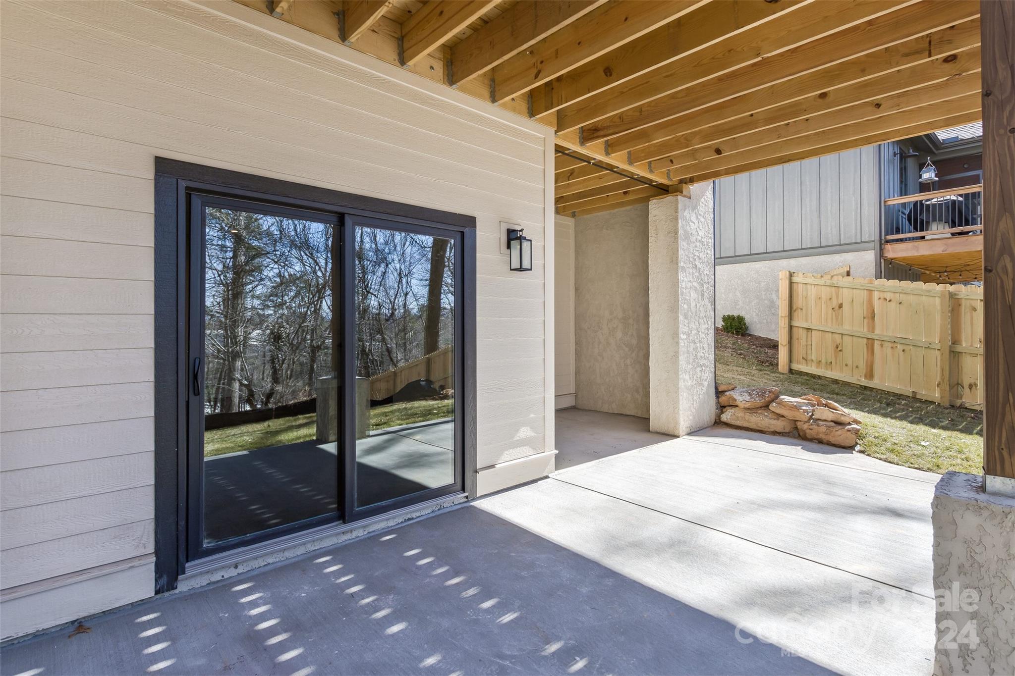 157 Gashes Creek Road Asheville, NC 28805 - Photo 41 of 43 a view of a room with wooden walls