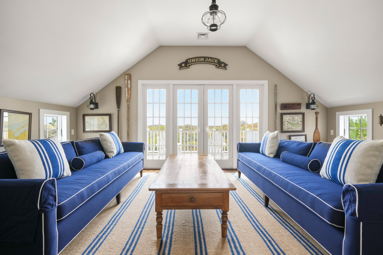 21 Quidnet Road Nantucket, MA 02554 - Photo 48 of 62 a living room with furniture and a floor to ceiling window