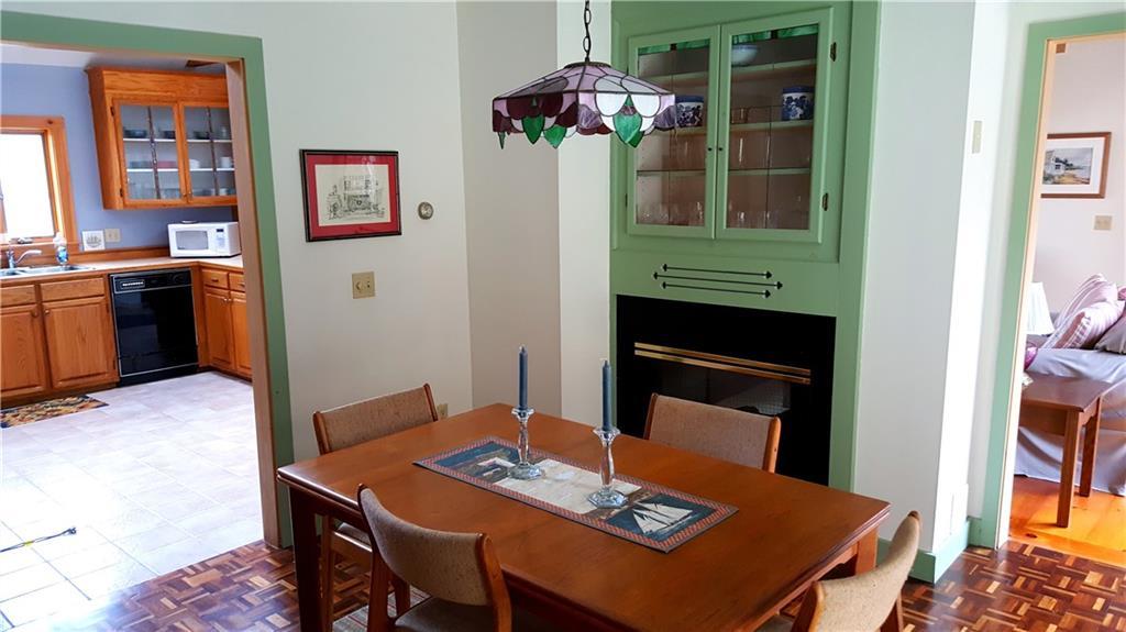 40 Old Cart Road Chebeague Island, ME 04017 - Photo 15 of 34 Dining room with fireplace