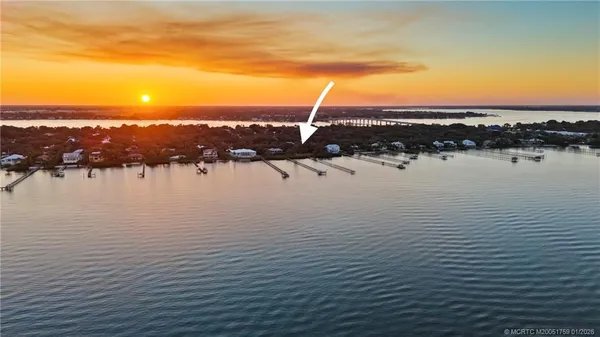 a view of a lake with a yard