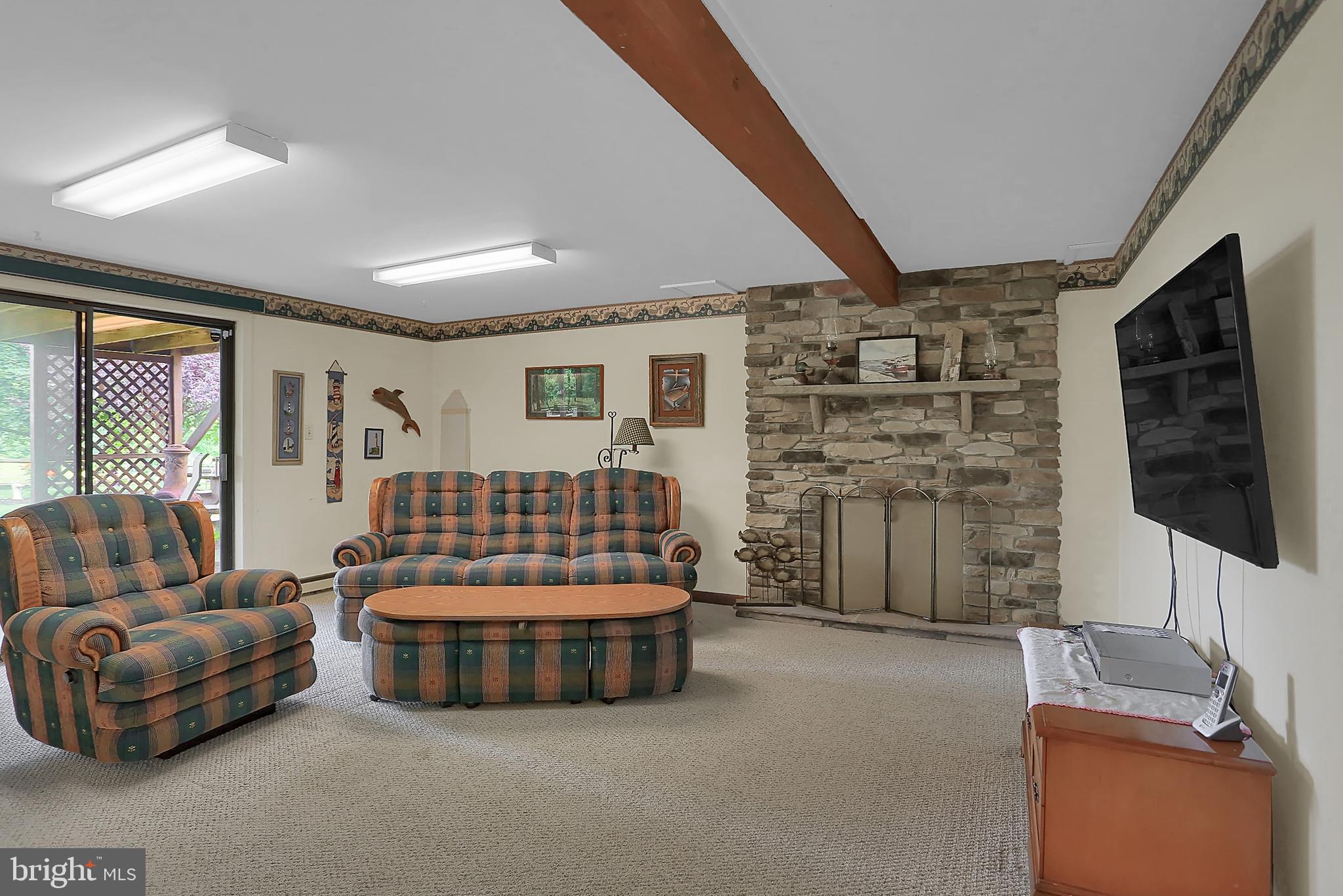 5535 Patton Bridge Road Greencastle, PA 17225 - Photo 17 of 45 Oversized lower level family room with fireplace
