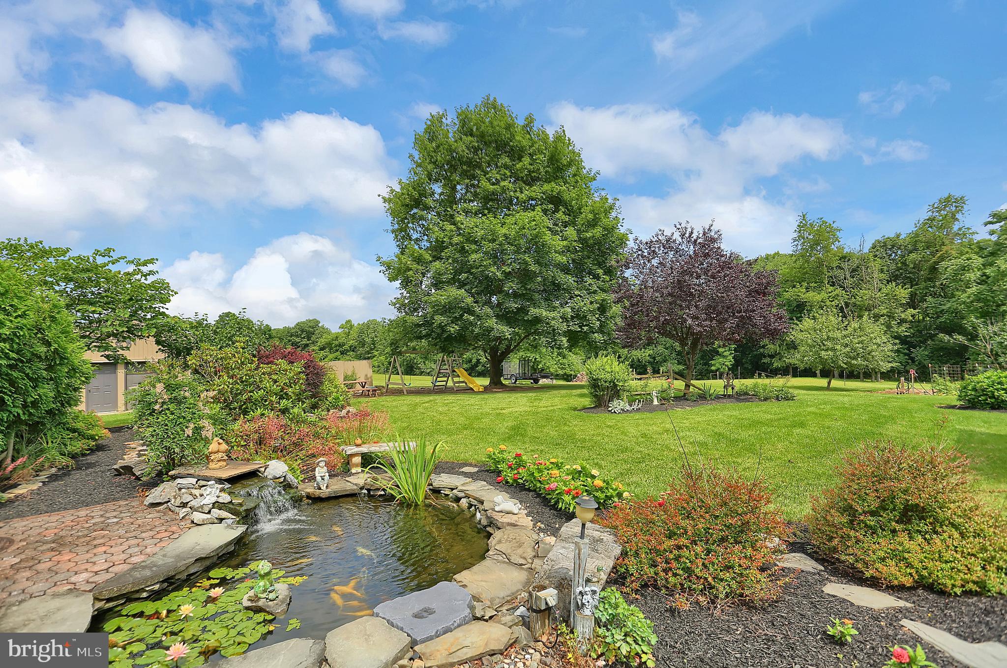 5535 Patton Bridge Road Greencastle, PA 17225 - Photo 23 of 45 Enjoy the Koi pond on the patio