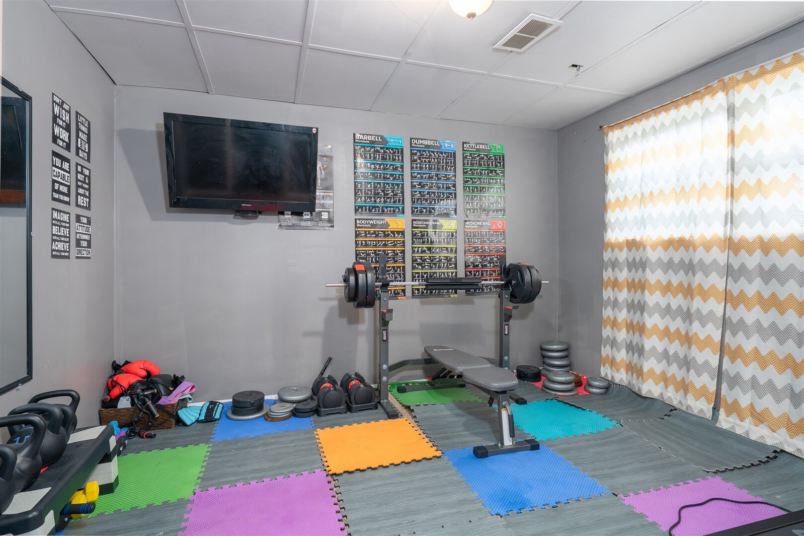 1701 Hoover Drive Normal, IL 61761 - Photo 20 of 30 a living room with furniture and a flat screen tv