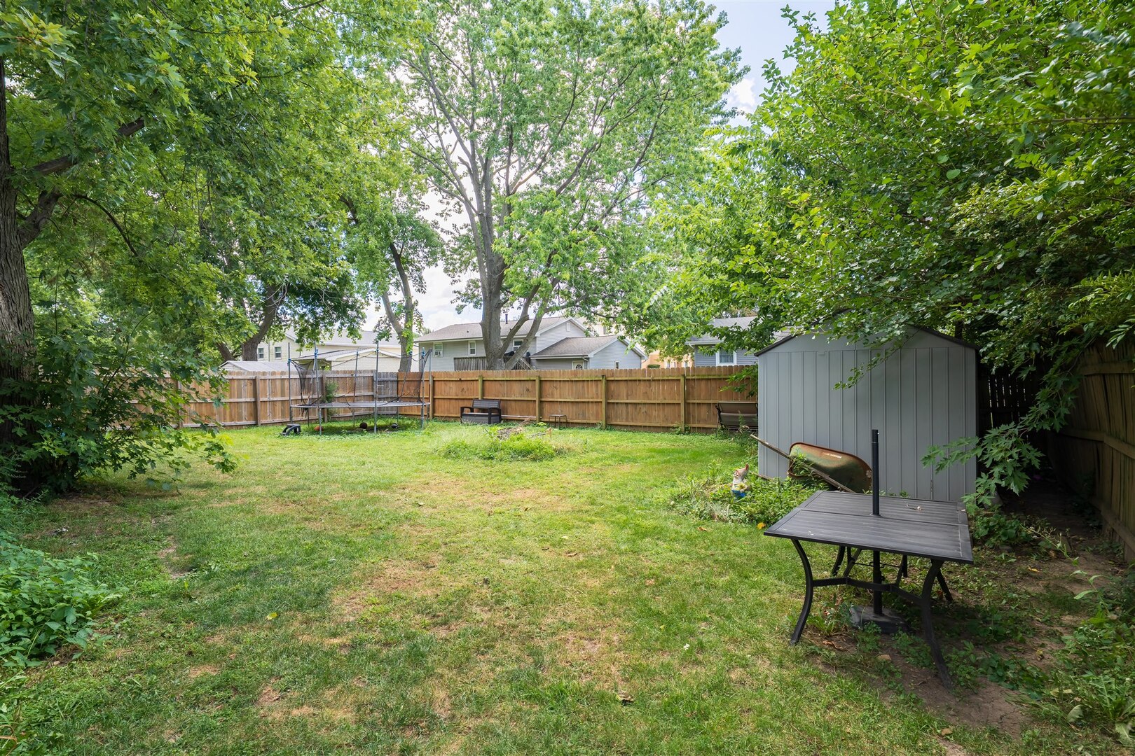1701 Hoover Drive Normal, IL 61761 - Photo 27 of 30 a view of a backyard with a garden and sitting area