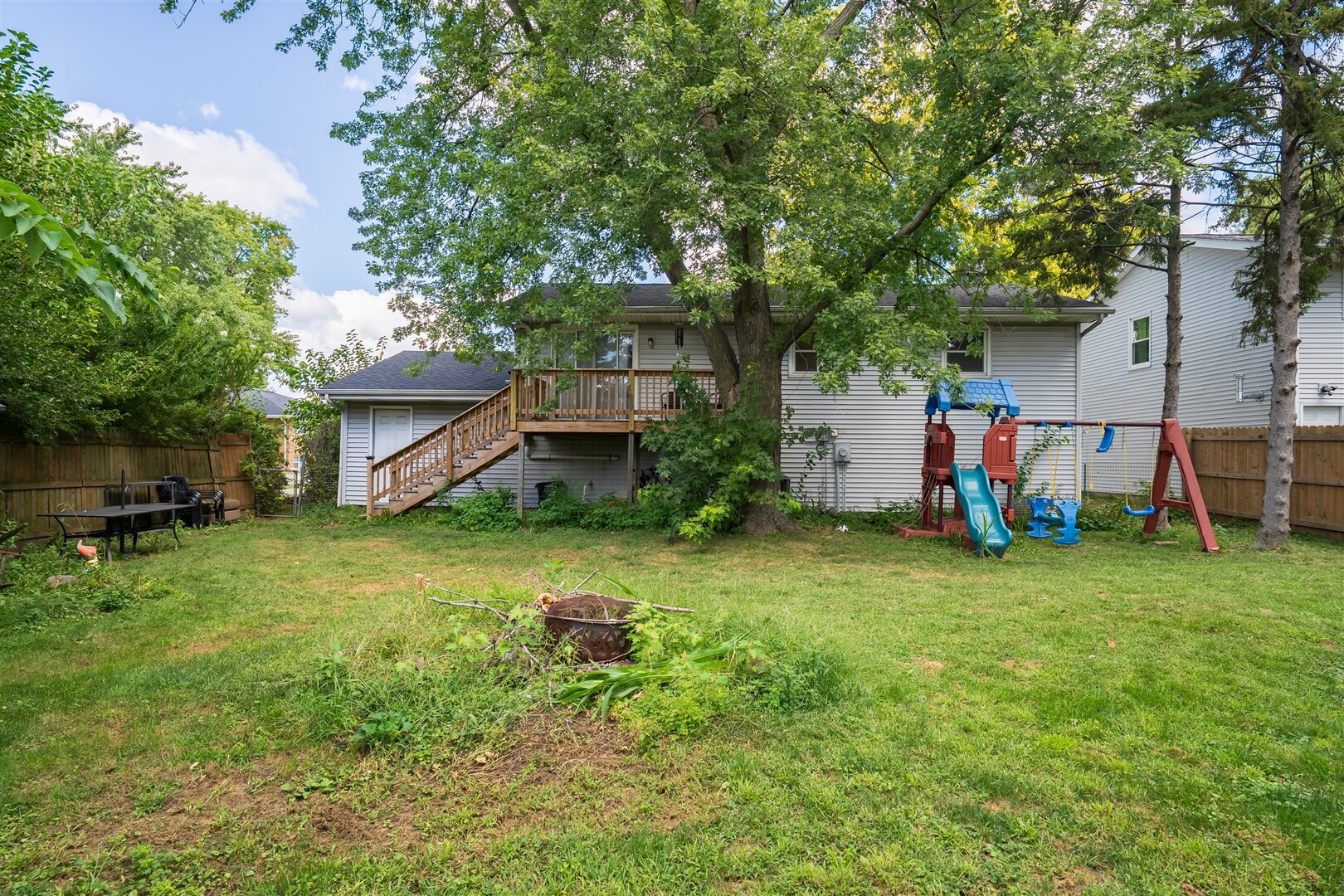 1701 Hoover Drive Normal, IL 61761 - Photo 28 of 30 a front view of a house with a yard and tree