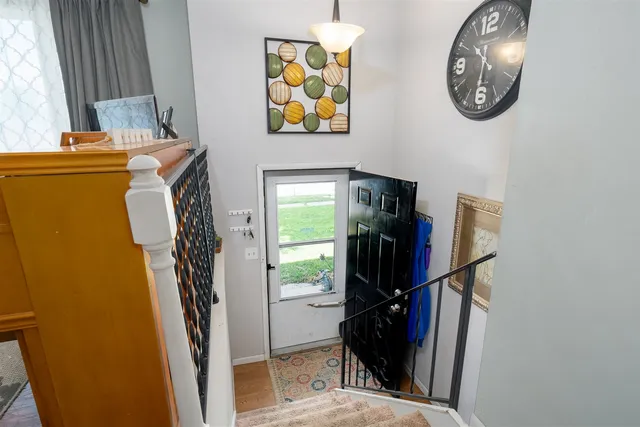 a view of walk in closet with clothes