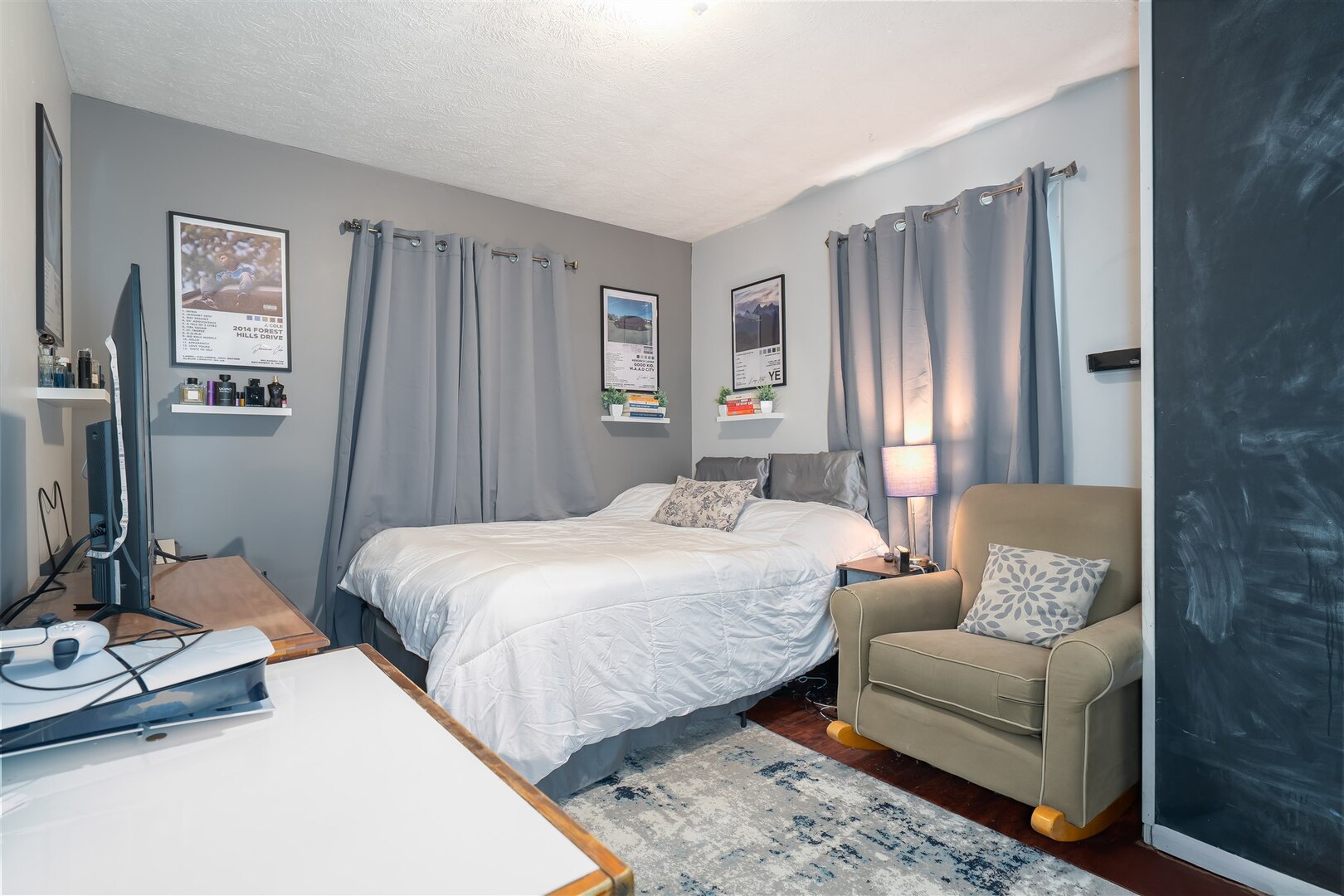 1701 Hoover Drive Normal, IL 61761 - Photo 10 of 30 a bedroom with a bed couch and a window