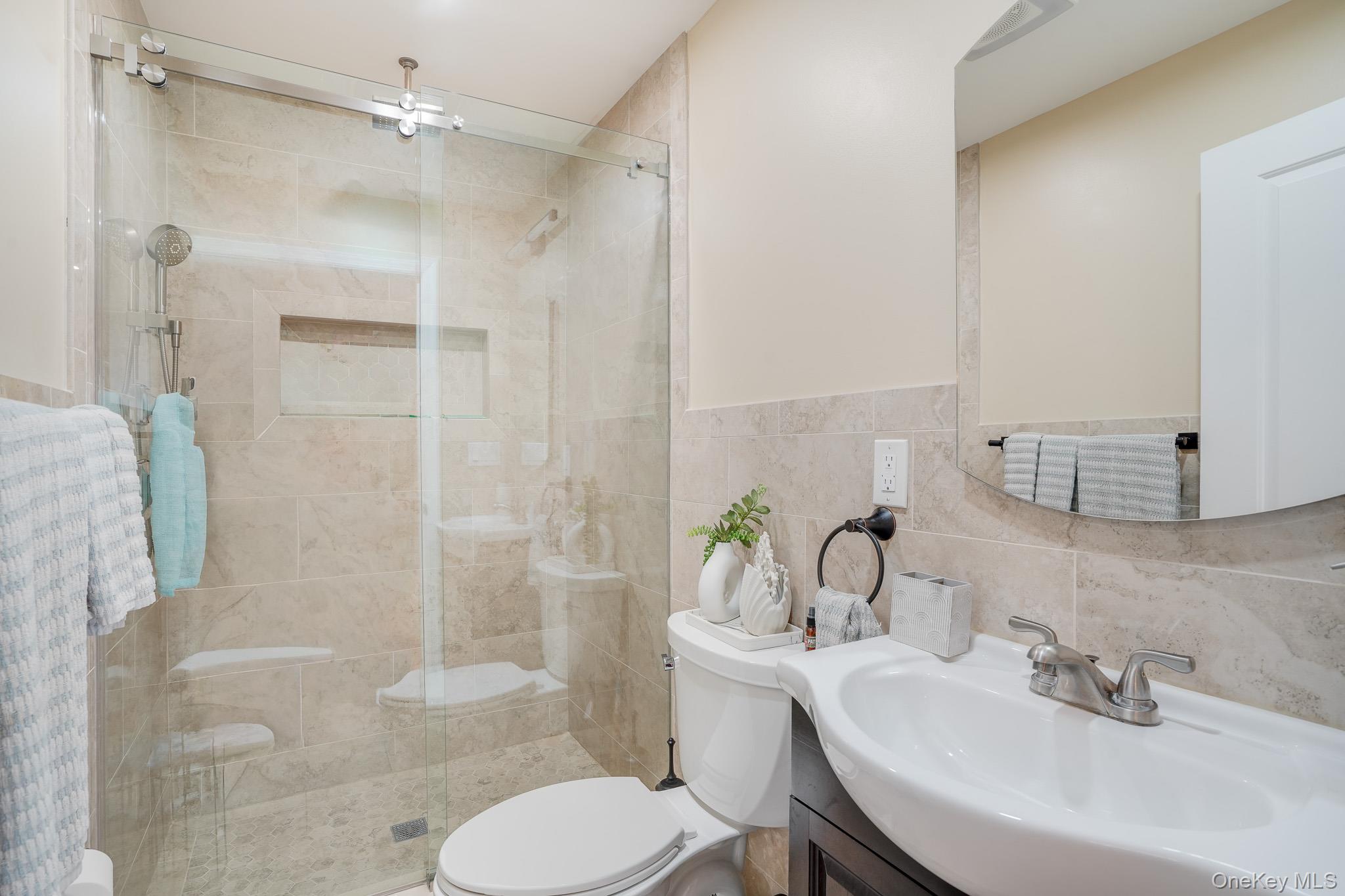 609 Washington Street Peekskill, NY 10566 - Photo 16 of 37 Full bathroom in the main level.