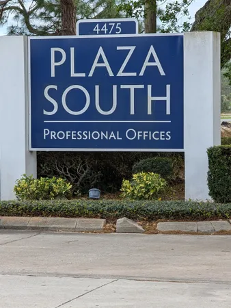 a sign that is on the side of a building