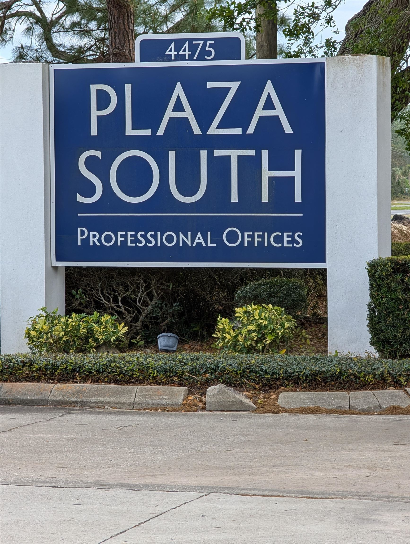 a sign that is on the side of a building