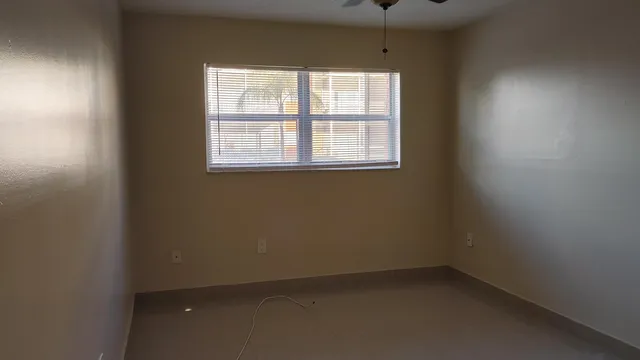 an empty room with a window