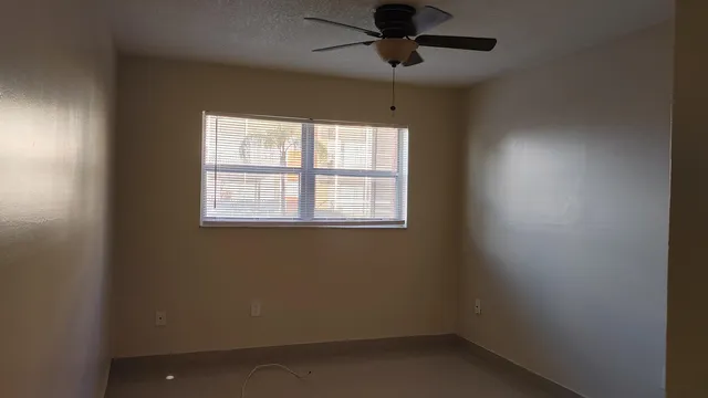 an empty room with a window