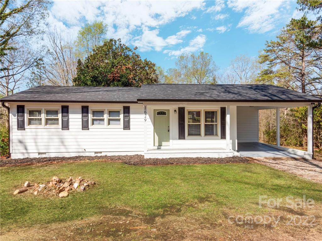 1629 Wadell Stinson Road Lancaster, SC 29720 - Photo 3 of 23 a house that has a big yard in front of it