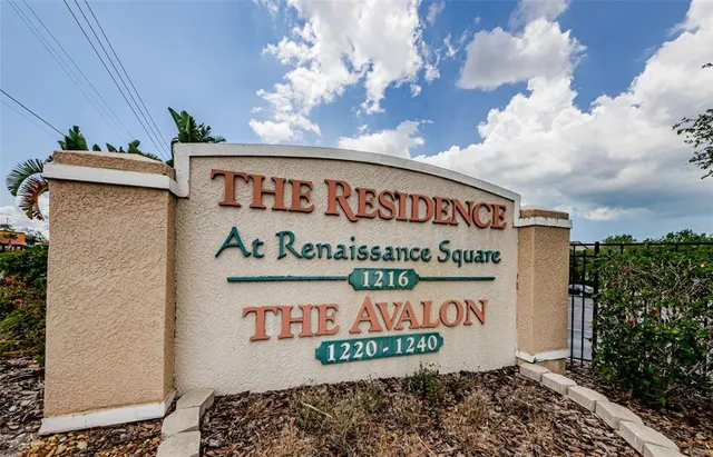 a sign on the wall of the building