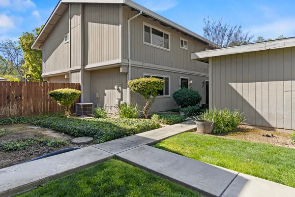a view of a back yard of the house