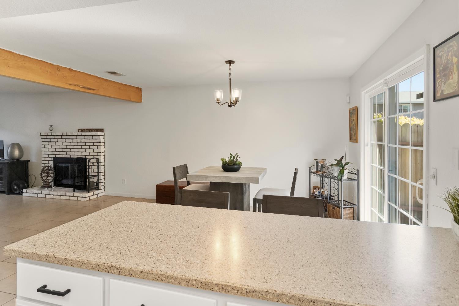 7428 Ranch Avenue Citrus Heights, CA 95610 - Photo 26 of 49 a living room with furniture and a fireplace