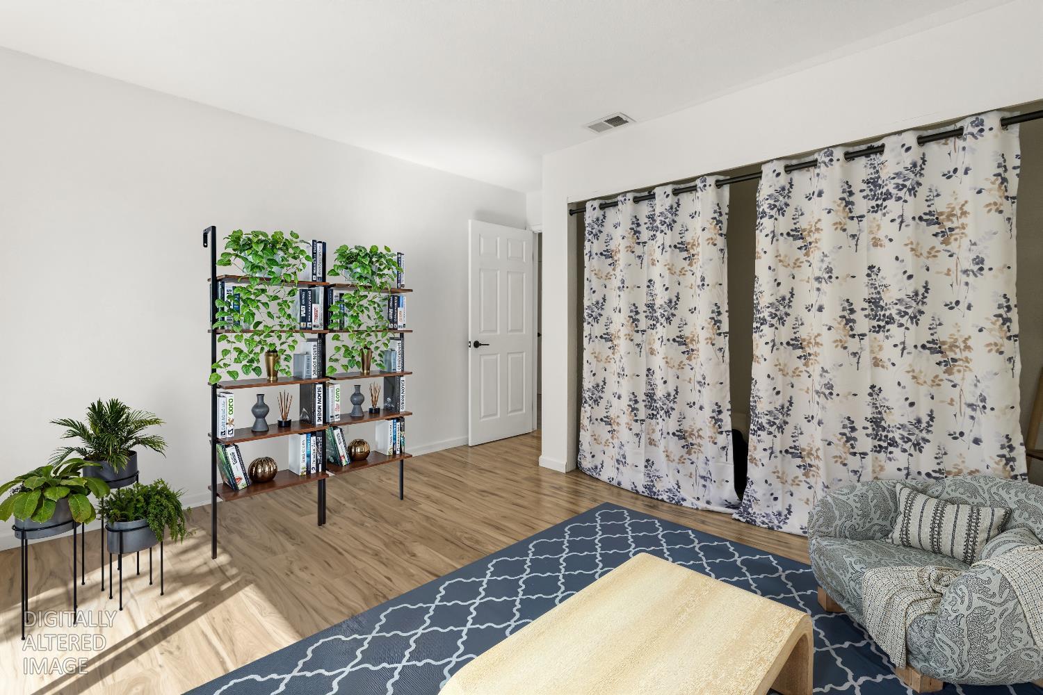 7428 Ranch Avenue Citrus Heights, CA 95610 - Photo 33 of 49 a living room with furniture and a large window