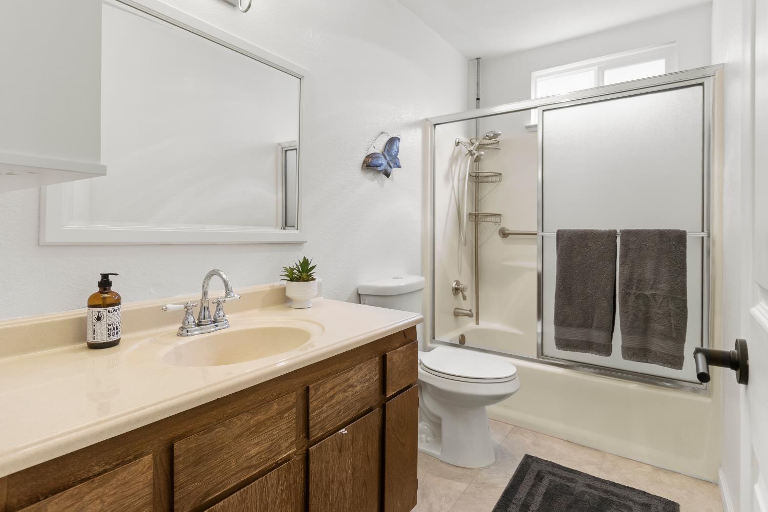7428 Ranch Avenue Citrus Heights, CA 95610 - Photo 37 of 49 a bathroom with a sink a toilet and shower