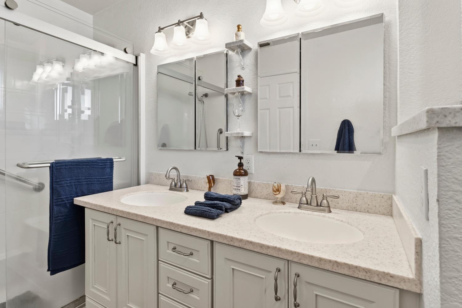 7428 Ranch Avenue Citrus Heights, CA 95610 - Photo 44 of 49 a bathroom with a sink double vanity and a mirror